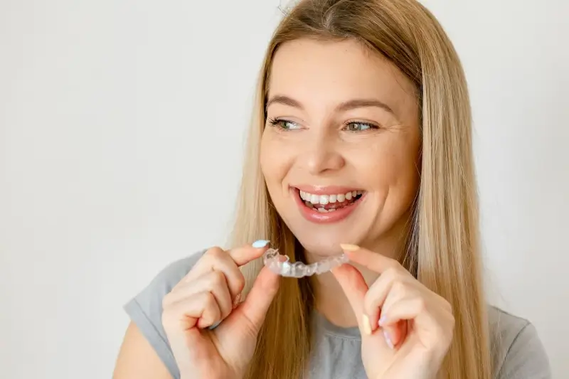 Zakończenie leczenia nakładkami Invisalign